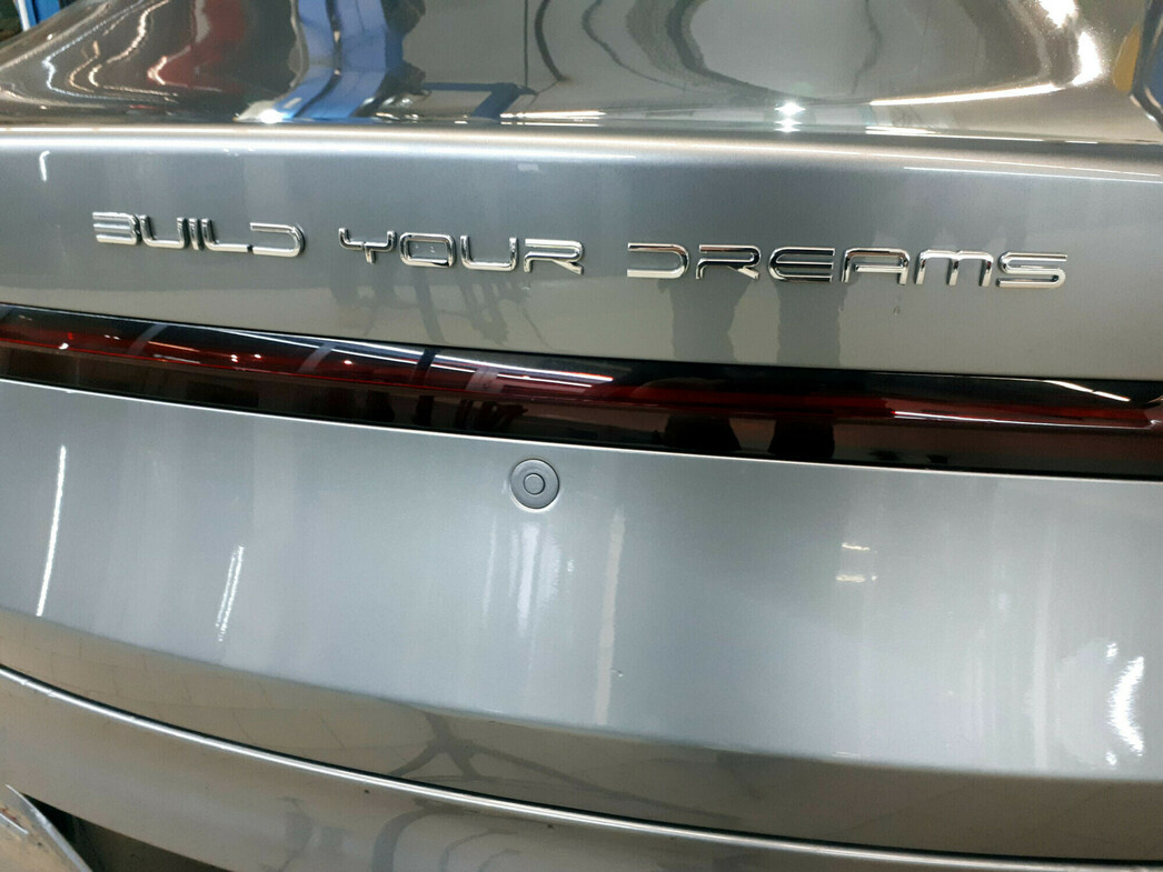 Багажник открывается кнопкой